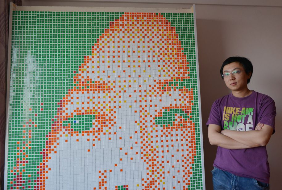 Tong Aonan spent 20 hours building the portrait of out of Rubik's cubes. 