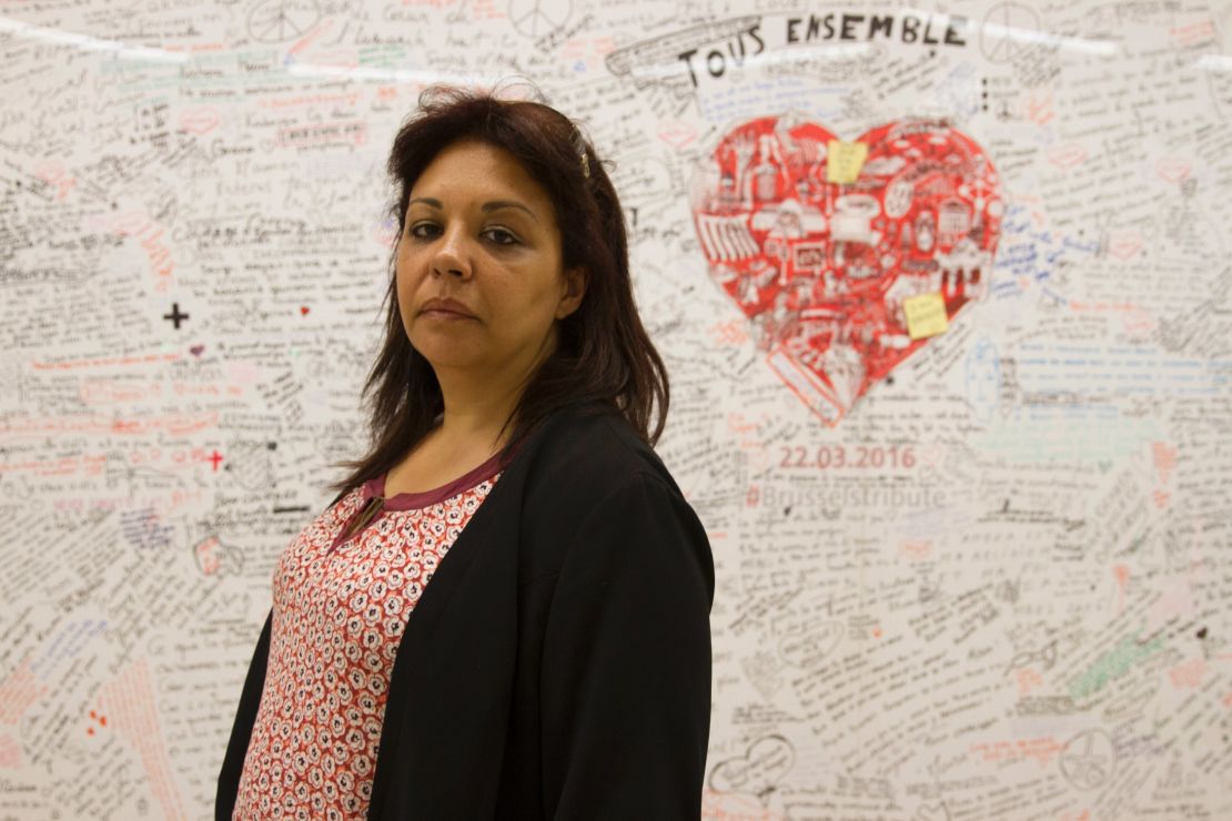 Saliha Ben Ali at the mural at Maalbeek metro station honoring the victims of the Brussels terror attacks on March 22. 