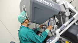 GUANGZHOU, CHINA - APRIL 15: (CHINA OUT) Surgeons operate a da Vinci Surgical robot to remove the tumor at the First Affiliated Hospital of Sun Yat-sen University on April 15, 2015 in Guangzhou, Guangdong province of China. Intuitive Surgical Inc. is an American corporation that manufactures robotic surgical systems, most notably the da Vinci Surgical System. The da Vinci Surgical System allows surgery to be performed using robotic manipulators. (Photo by ChinaFotoPress/ChinaFotoPress via Getty Images)