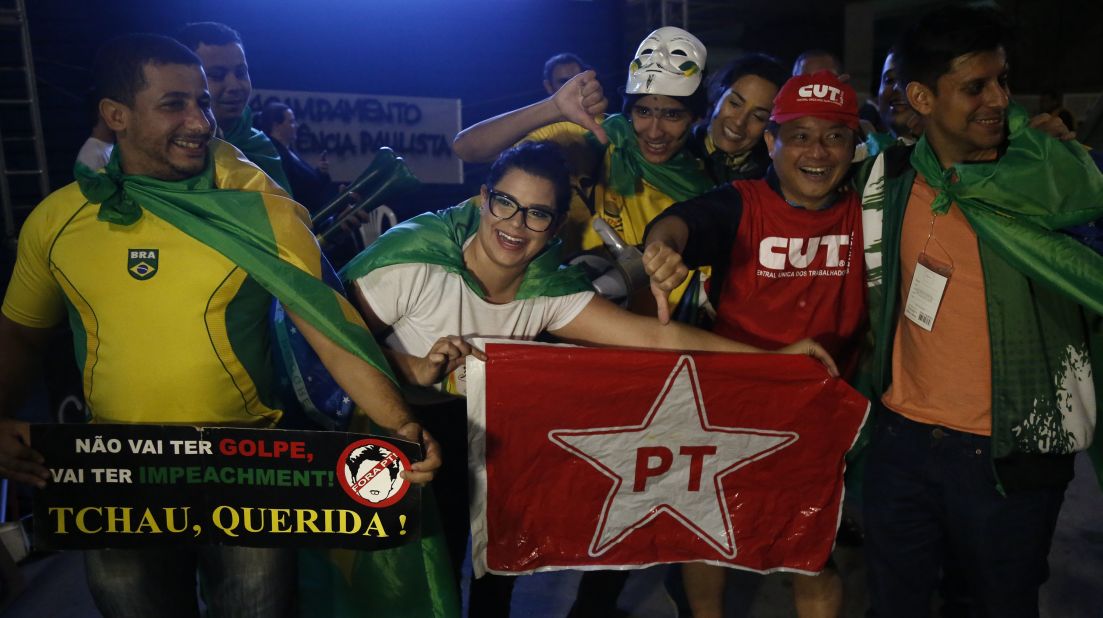 Brazilians celebrate the impeachment of President Dilma Rousseff in Sao Paulo, Brazil on May 12, 2016. The former leader <a href="http://www.cnn.com/2016/05/12/americas/brazil-rousseff-impeachment-vote/index.html">denounced the move as "a coup."</a>