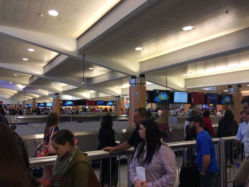 Kym Jones waited in line for two hours at Atlanta's Hartsfield-Jackson International Airport on Friday.