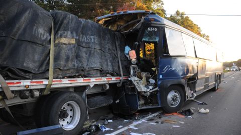 One person died and dozens were injured in the crash.