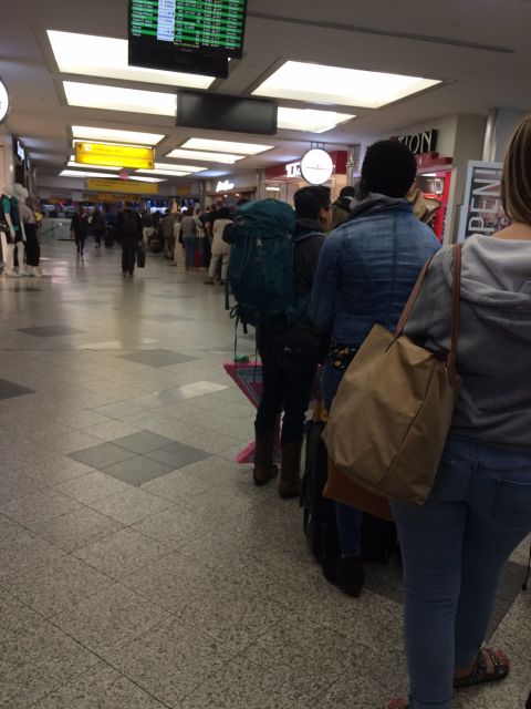 Lisa Akey said she waited in line for 35 minutes Friday morning at LaGuardia Airport. She said the Transportation Safety Administration let people who had earlier flights go through lines faster.