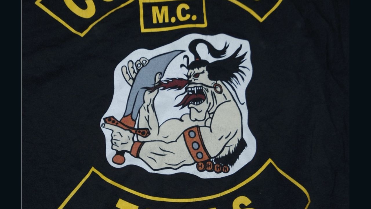 The Cossacks patch features a caricature of a wild-eyed, sneering cossack with scimitar poised to strike.