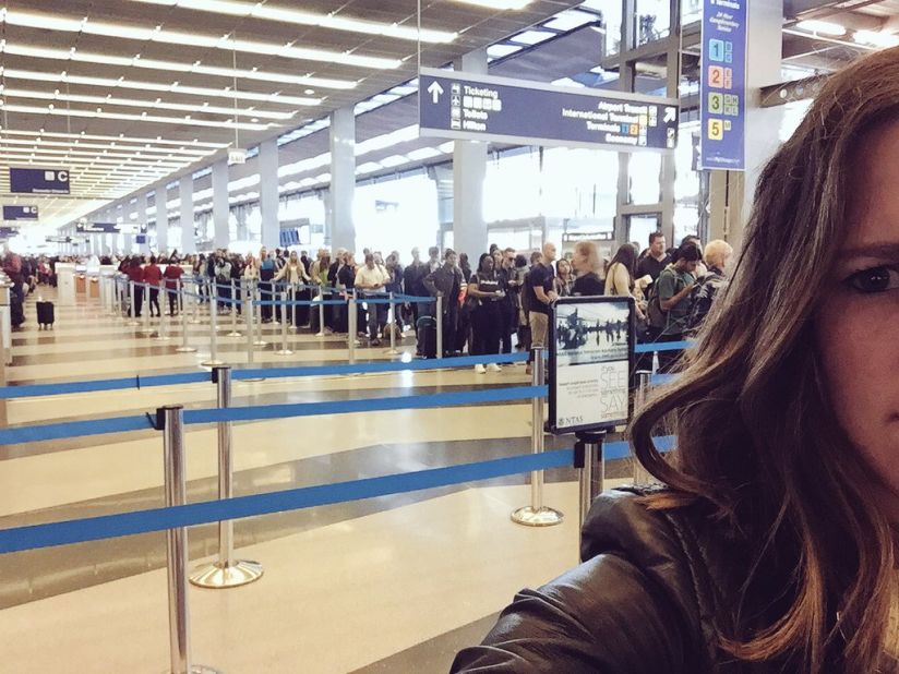 It took Erin Fooch two hours to get through security at O'Hare on Friday morning. She just made her flight, but her boss wasn't so fortunate. 