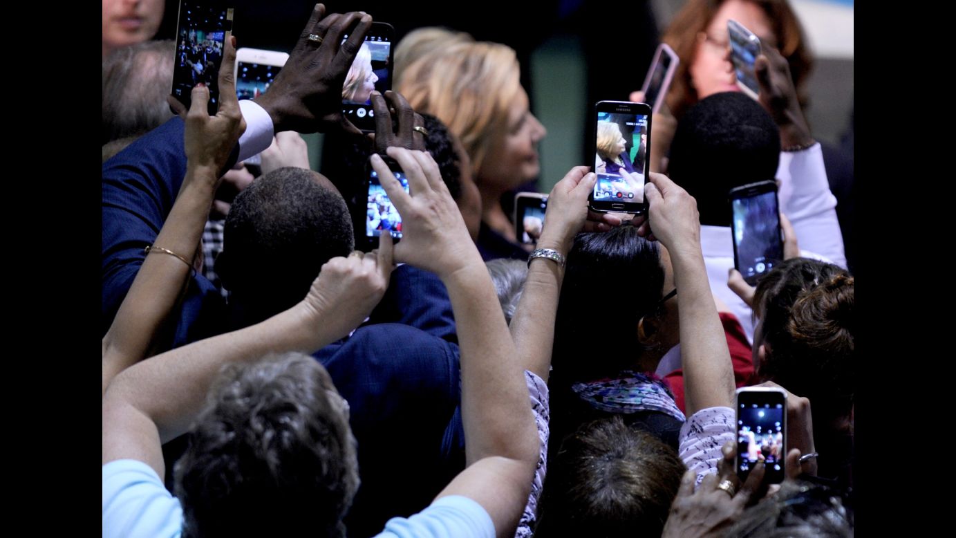 People take photos of Democratic presidential candidate Hillary Clinton during a campaign event in Blackwood, New Jersey, on Wednesday, May 11.