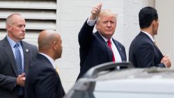 Republican presidential candidate Donald Trump waves as he arrives for a meeting with House Speaker Paul Ryan of Wis., at the Republican National Committee Headquarters on Capitol Hill in Washington, Thursday, May 12, 2016. Trump and Ryan are sitting down face-to-face for the first time, a week after Ryan stunned Republicans by refusing to back the mercurial billionaire for president.  (AP Photo/Andrew Harnik)
