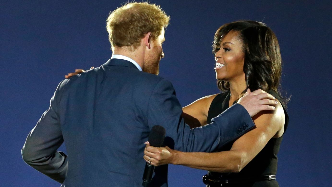 Britain's Prince Harry greets U.S. first lady Michelle Obama during the opening ceremony of the Invictus Games, which took place Sunday, May 8, in Kissimmee, Florida. The Invictus Games were created by Prince Harry for wounded, injured and sick service members. Fifteen countries participated this year.