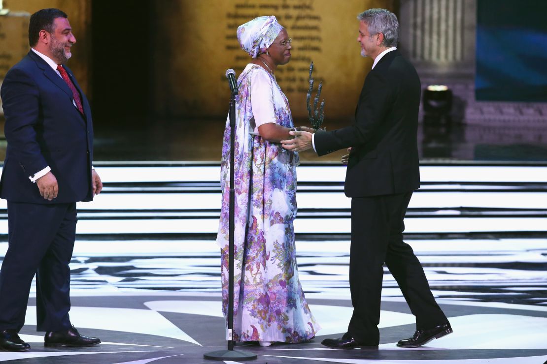 Marguerite Barankitse accepts the inaugural Aurora Prize for Awakening Humanity from George Clooney in Armenia on April 24 2016.
