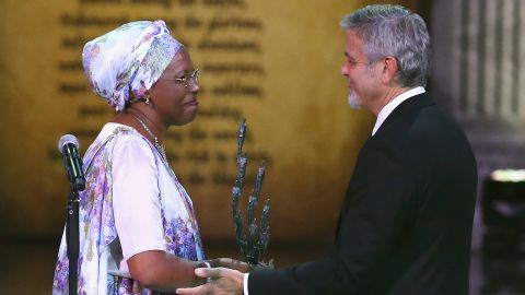 Marguerite Barankitse accepts the inaugural Aurora Prize for Awakening Humanity from George Clooney in Armenia on April 24 2016.