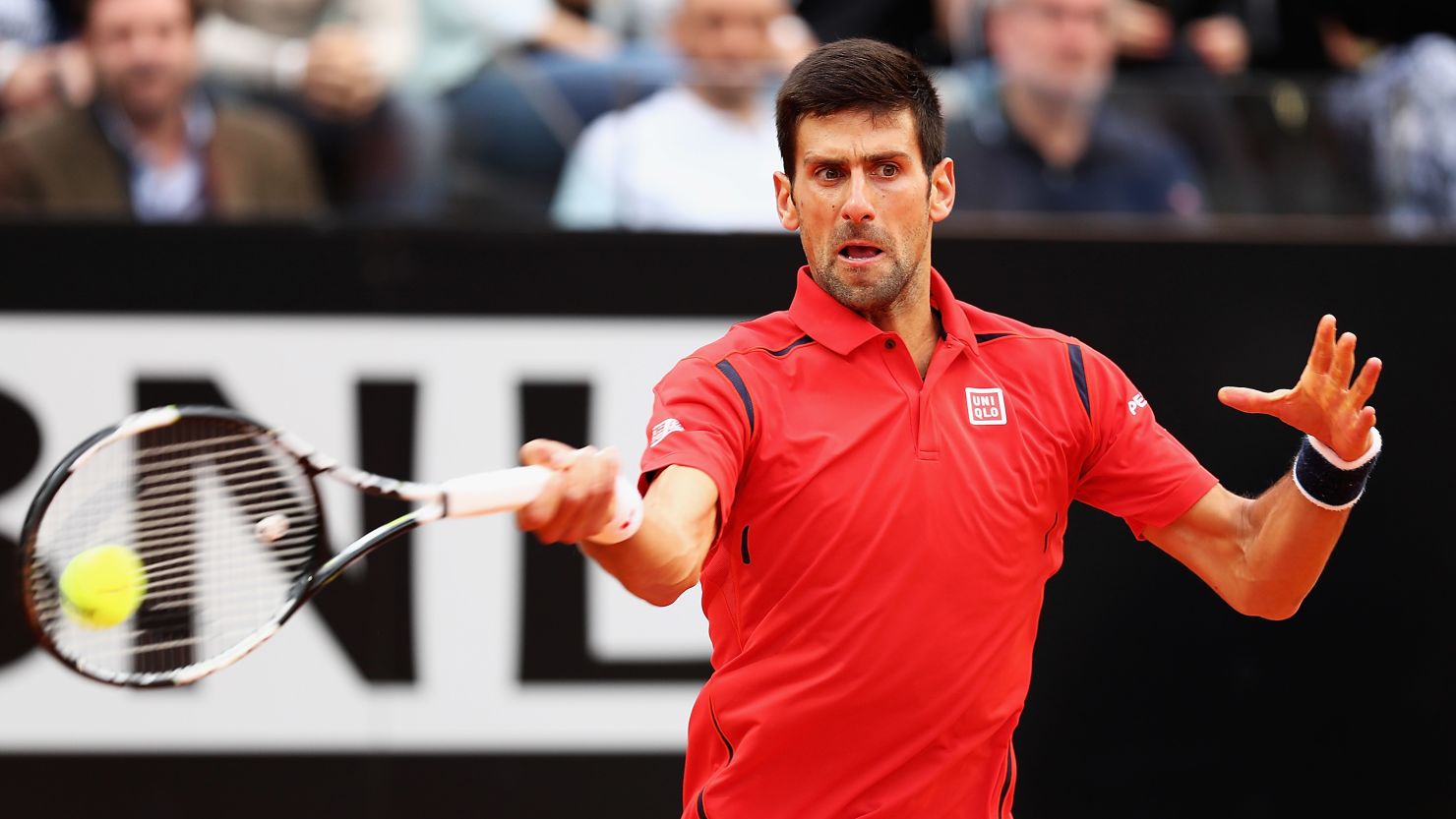 Novak Djokovic strikes a forehand during his straight-set win over Rafael Nadal at the Italian Open. 