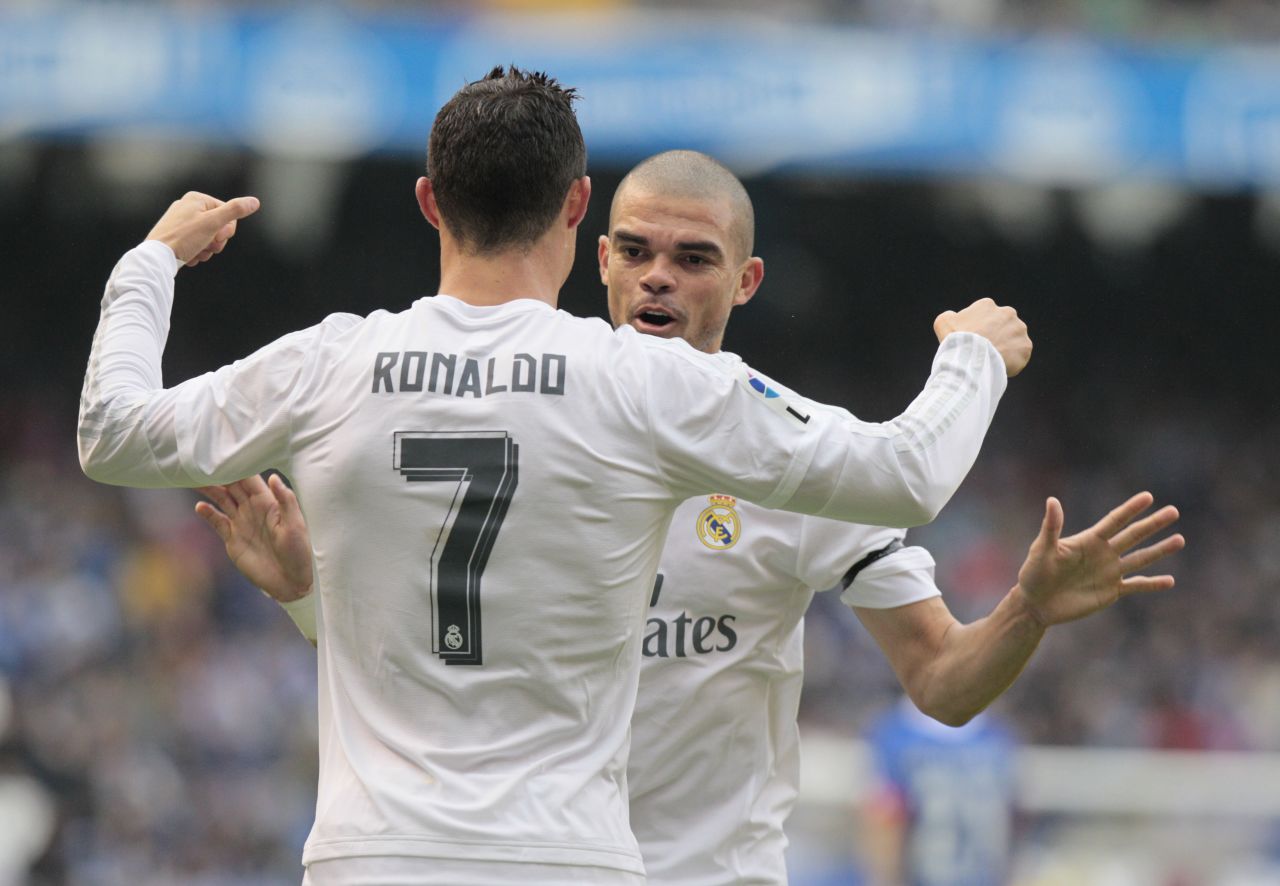 Real Madrid's Cristiano Ronaldo is, congratulated by Pepe after scoring the first goal at Deportivo.