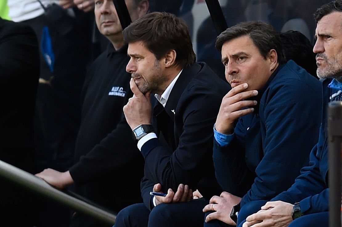 Mauricio Pochettino cuts a folorn figure on the Spurs bench as he watches his side lose 5-1.