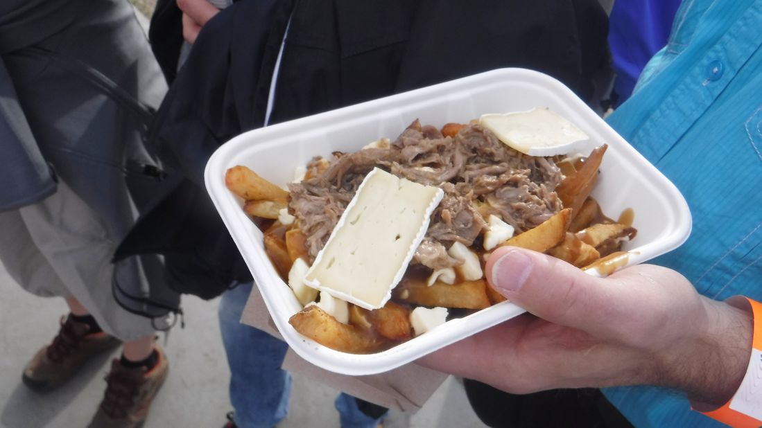 Fries, gravy and cheese curds. Doesn't look great, but 35 million Canadians can't be wrong.