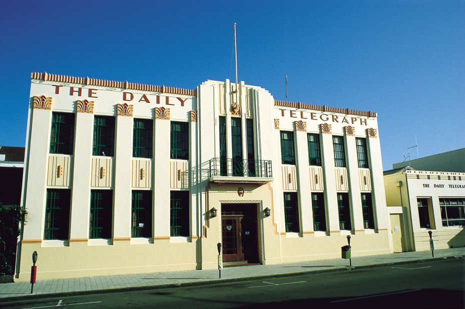 The Daily Telegraph building, designed by E. A. Williams, is one of Napier's most flamboyant Art Deco structures. Completed in 1932, it exhibits many recognizable Art Deco features including zig-zags, fountains, ziggurats and a sunburst at the base of the flag-pole.
