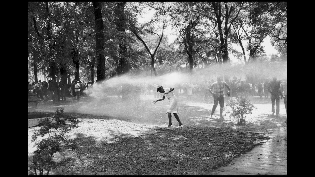 Firefighters turn their hoses on civil rights protesters in Birmingham in 1963.