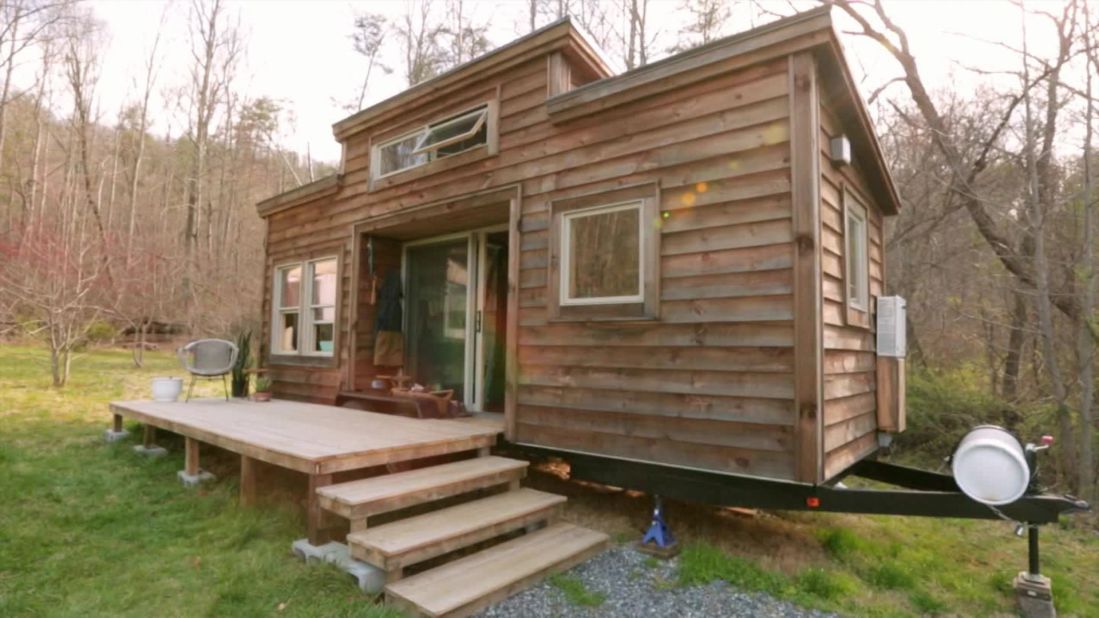 One-way of moving towards eco-friendly and carbon-free living is as simple as reducing the size of your home. The "Tiny House Movement"  (an example pictured above) is a transition towards building smaller homes and downsizing. Smaller homes, by their nature, have much less cooling and heating costs, and are powered by solar panels on the roof. 