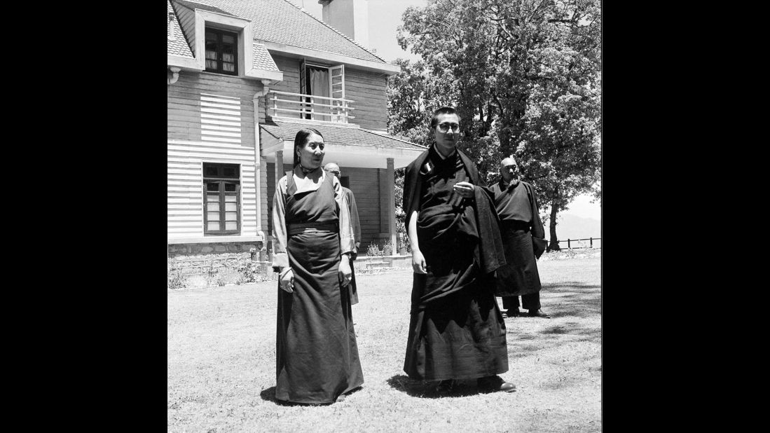 The Dalai Lama is seen with his mother outside the Birla House, his residence in Mussoorie. In 1960 he moved to Dharamsala, India, which remains his home today.