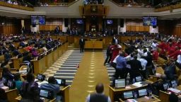 Members of the leftist opposition party were removed from South Africa's parliament after they tried to stop President Zuma from giving a speech.