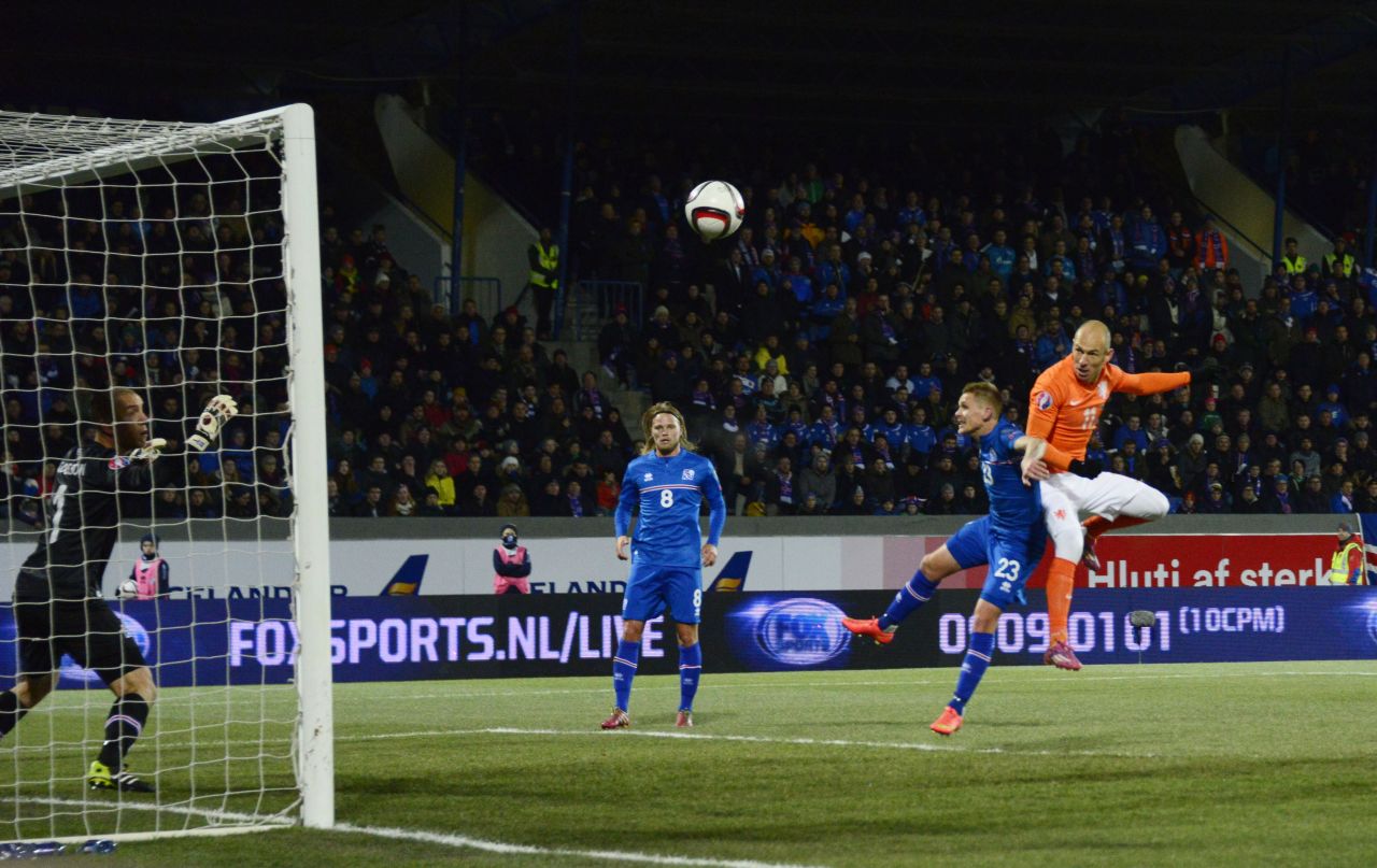 Defender Ari Freyr Skulason battles Dutch forward Arjen Robben. Iceland won both matches against the Netherlands, traditionally one of world football's superpowers. Those defeats contributed to the Dutch missing out on qualification for the tournament in France.