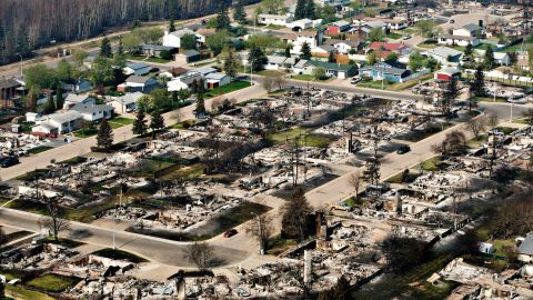 Remains of burned homes are seen in a neighborhood in Fort McMurray, Alberta, on Friday, May 13. A massive wildfire has <a href="http://www.cnn.com/2016/05/08/americas/fort-mcmurray-fire-canada/index.html" target="_blank">forced more than 88,000 people from their homes.</a>