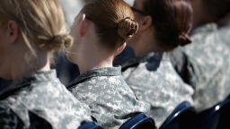 Soldiers, officers and civilian employees attend the commencement ceremony for the US Army's annual observance of Sexual Assault Awareness and Prevention Month in the Pentagon Center Courtyard March 31, 2015 in Arlington, Virginia.