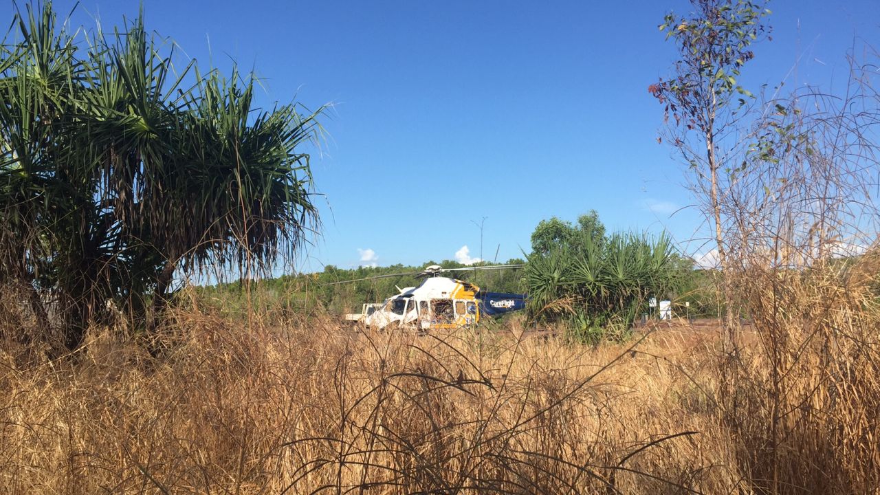 A CareFlight helicopter seen near the scene of a crocodile attack near Darwin.