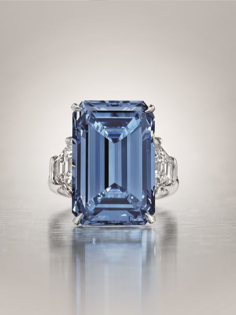 The world's largest blue diamond, an extremely rare gem known as "The Oppenheimer Blue", sold for $57.5 million at Christie's Geneva May 18, 2016. The 14.62 carat Fancy Vivid stone is mounted on a platinum ring and flanked on either side by a trapeze-shaped diamond.