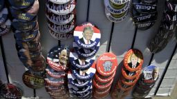 A vendor sells Trump buttons at a campaign stop for US Republican presidential candidate Donald Trump in Lynden, Washington, on May 7, 2016.    / AFP / Jason Redmond        (Photo credit should read JASON REDMOND/AFP/Getty Images)