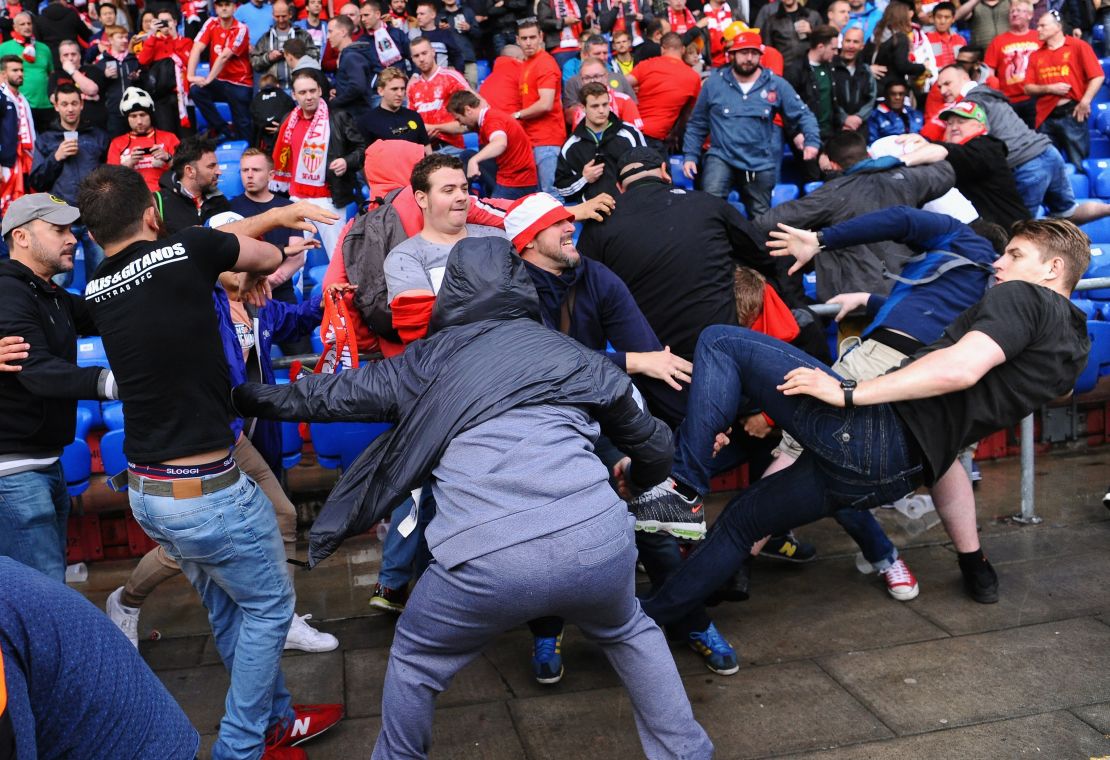 Fans scuffle prior to the UEFA Europa League Final match between Liverpool and Sevilla at St. Jakob-Park.