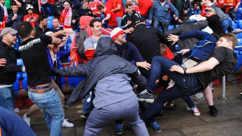 Fans scuffle prior to the UEFA Europa League Final match between Liverpool and Sevilla at St. Jakob-Park.