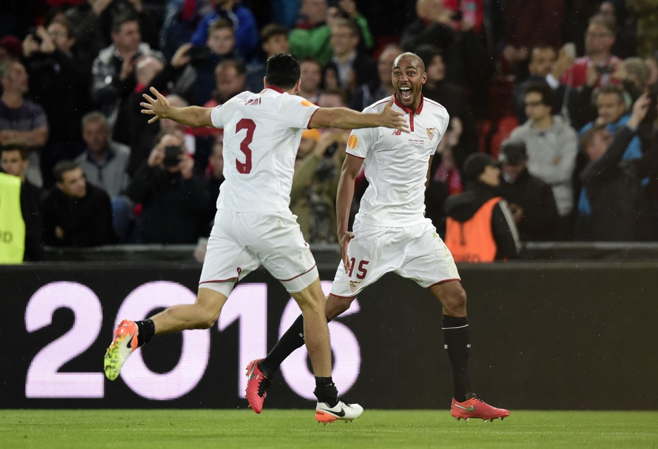 Sevilla's French defender Adil Rami (L) celebrates with fellow countryman and teammate Steven N'Zonzi on full time in Basel.