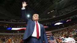 Republican presidential candidate Donald Trump waves to the audience gathered for a campaign rally at the American Airlines Center on September 14, 2015 in Dallas, Texas. More than 20,000 tickets have been distributed for the event.  