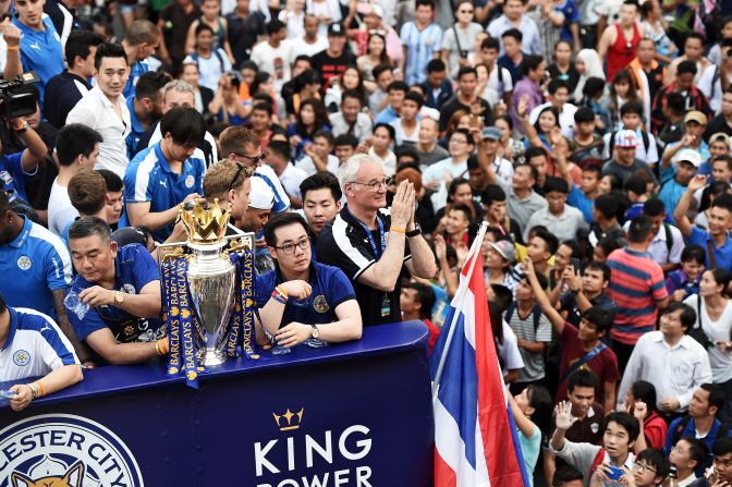 Leicester City manager Claudio Ranieri (center) gives a traditional Thai "wai" gesture of welcome as fans of the English Premier League soccer champions greet the Thai-owned team in Thailand's capital, Bangkok. Ranieri steered Leicester, owned by billionaire businessman Vichai Srivaddhanaprabha, to the most unlikely triumph in Premier League history as it won the competition by 10 points from second-placed Arsenal. Jon Sanders, the Leicester player liaison officer, <a href="index.php?page=&url=http%3A%2F%2Fwww.leicestermercury.co.uk%2FLeicester-City-parade-Premier-League-trophy%2Fstory-29294144-detail%2Fstory.html" target="_blank" target="_blank">told the Leicester Mercury newspaper</a>: "One million people on the streets to welcome the Premier League champions in Bangkok. Incredible."