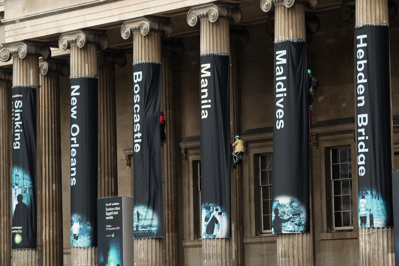 Greenpeace activists hang banners on the front of the British Museum on May 19, 2016 in London, England. 