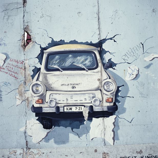 A painting of a Trabant car bursting through a wall in post unification Berlin, August 1993. Formula E are hoping Saturday's race will be another breakthrough moment for electric cars.  