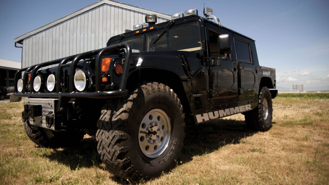 The colossal Hummer boasts off-road lights, a 360-degree spotlight, a grille guard, diamond-plate bumpers, oversized off-road wheels and tires and an external PA system with three sirens.