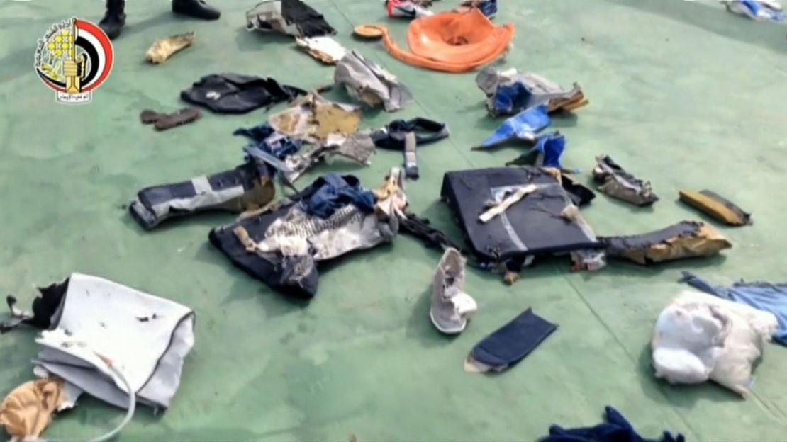 The debris includes passengers' belongings from the plane.