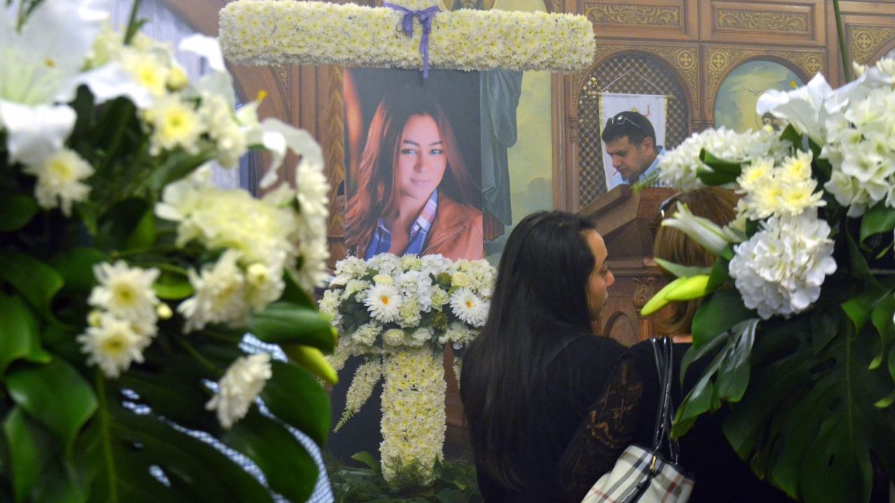 A portrait of Yara Hani Faraq Tawfiq is seen during a memorial service.