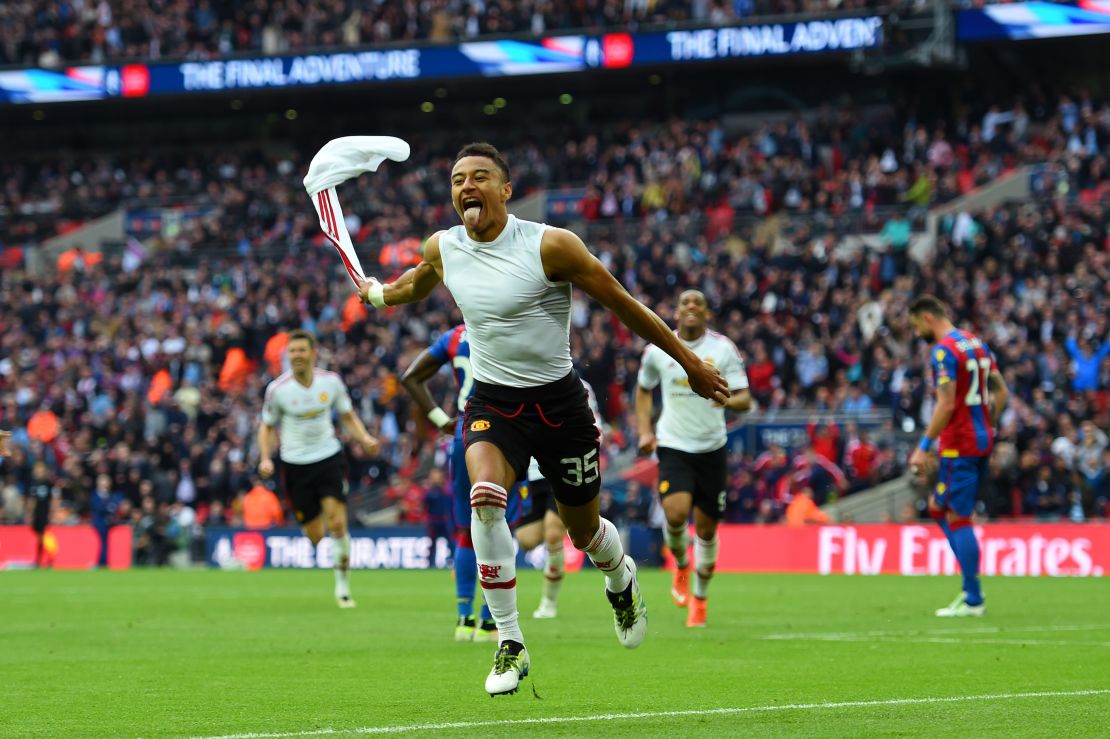 Jesse Lingard celebrates scoring the winning goal in the 2016 FA Cup final.