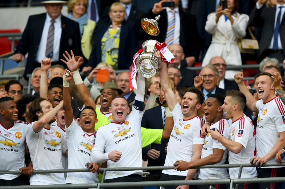 United's players celebrate winning the 2016 FA Cup after beating Crystal Palace 2-1 in the final. It was the club's first triumph in the competition since 2004.