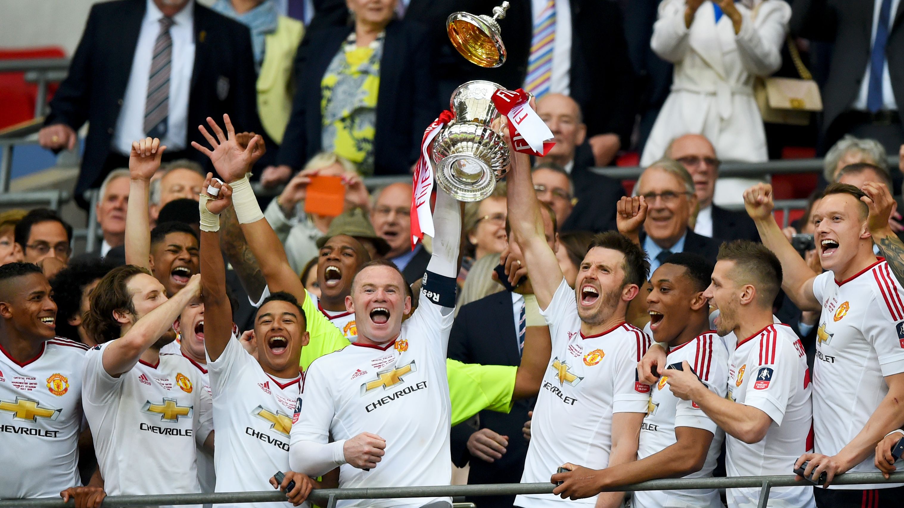 Manchester United players celebrate winning the 2016 FA Cup final.
