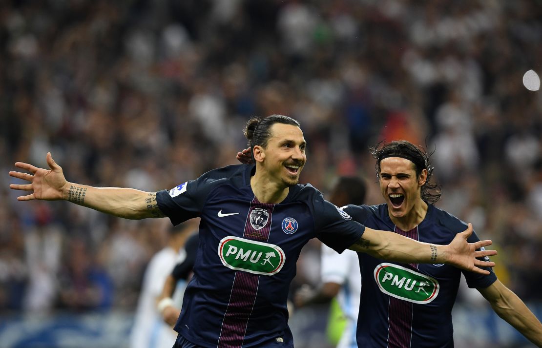 Paris Saint-Germain's Swedish forward Zlatan Ibrahimovic (L) celebrates with Paris Saint-Germain's Uruguayan forward Edinson Cavani (R) after scoring a goal during the French Cup final.
