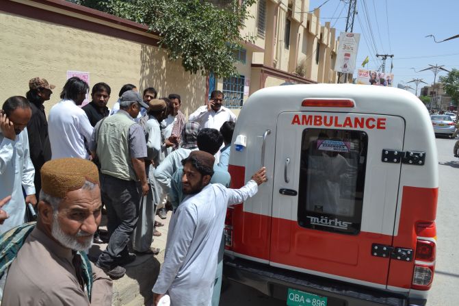 Coffins of two people, one believed to contain the body of the Taliban leader, arrive at the morgue in Quetta, Pakistan, on May 22.