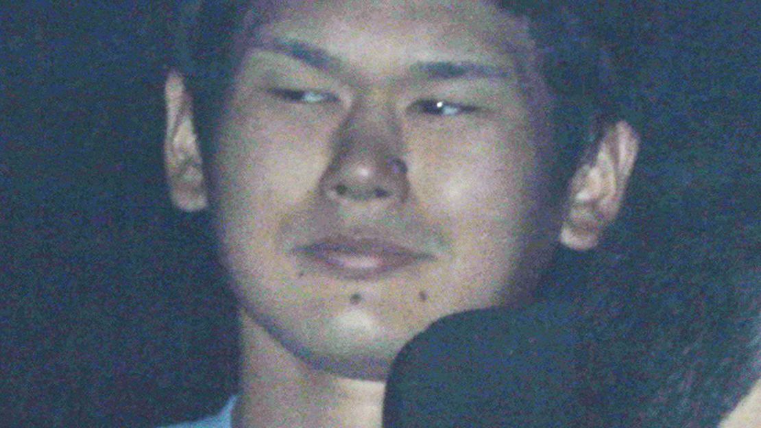 Tomohiro Iwazaki, 20, is seen inside a police vehicle in Tokyo, Japan, on Monday, May 23, after being arrested for a knife attack on Japanese pop star Mayu Tomita as she was waiting to appear for a concert.