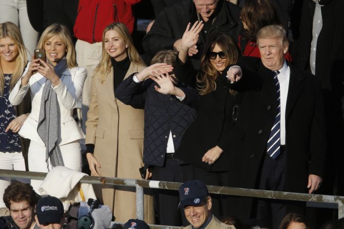 Republican presidential candidate Donald Trump, accompanied by his wife, Melania, second right, and former wife Marla Maples, second left, watches his daughter Tiffany graduate from the University of Pennsylvania on Sunday, May 15. 