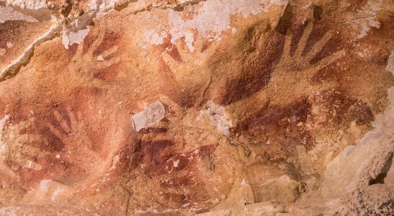 Sulawesi's Maros-Pangkep karst region is riddled with ancient caves. At least 39,900 years ago, human beings lived in these caves and left their mark. Sometimes, they made paint, sucked it into their mouths and sprayed it around their hands, leaving ghostly stencils.<br />