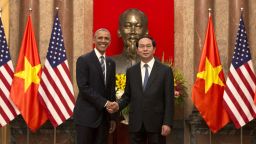 U.S. President Barack Obama, left,  and Vietnamese President Tran Dai Quang shake hands at the Presidential Palace in Hanoi, Vietnam, Monday, May 23, 2016. The president is on a weeklong trip to Asia as part of his effort to pay more attention to the region and boost economic and security cooperation. (AP Photo/Carolyn Kaster)