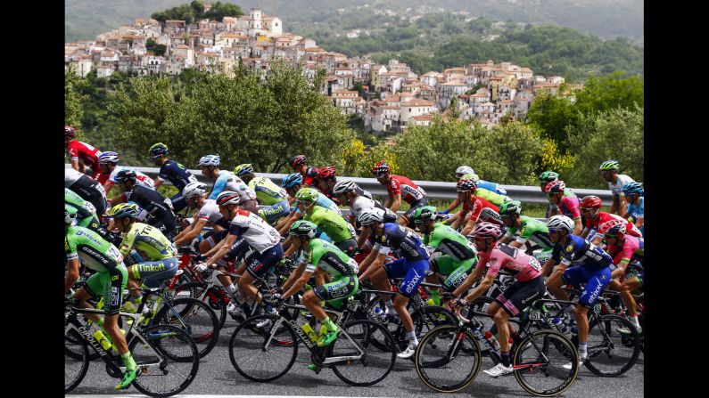 The pack rides past Rivello village during the 5th stage of 99th Giro d'Italia, Tour of Italy, from Praia a Mare to Benevento of 233 km on May 11, in Benevento.