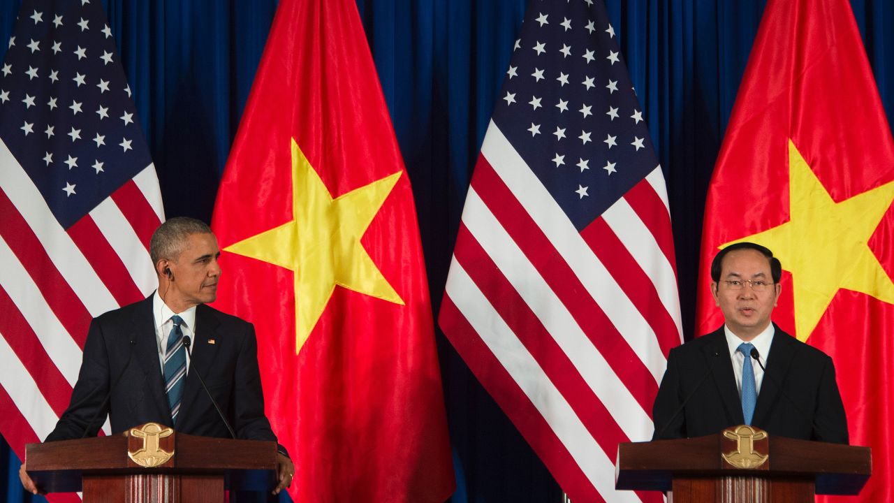 US President Barack Obama and Vietnamese President Tran Dai Quang speak during a joint press conference in Hanoi on May 23, 2016.
Barack Obama praised "strengthening ties" between the United States and Vietnam at the start of a landmark visit May 23, as the former wartime foes deepen trade links and share concerns over Chinese actions in disputed seas. / AFP / JIM WATSON (Photo credit should read JIM WATSON/AFP/Getty Images)